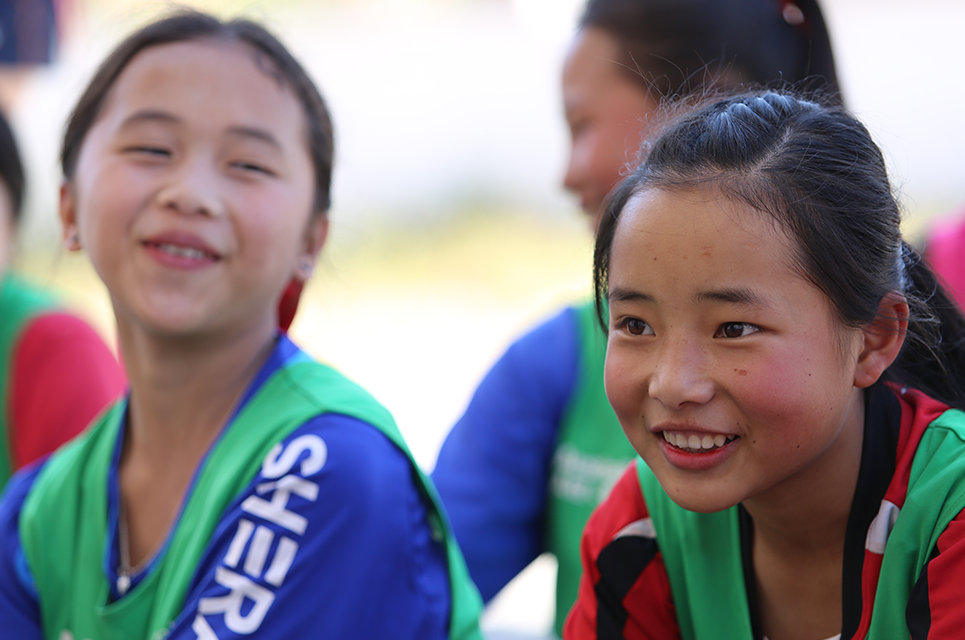 ChildFund Pass It Back female players in Laos